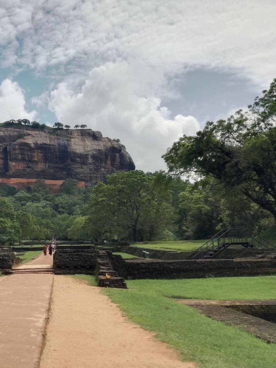 The Sigiriya rock fortress rising above its gardens