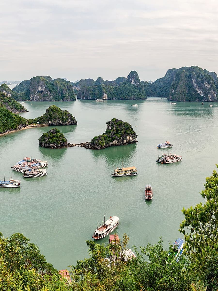 Boats among the limestone islands of Ha Long Bay