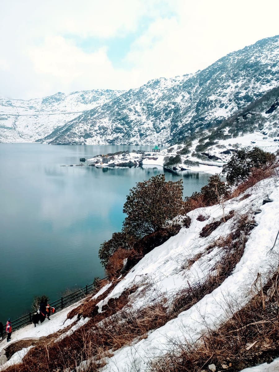 Snow on the slopes around Tsomgo Lake, Sikkim