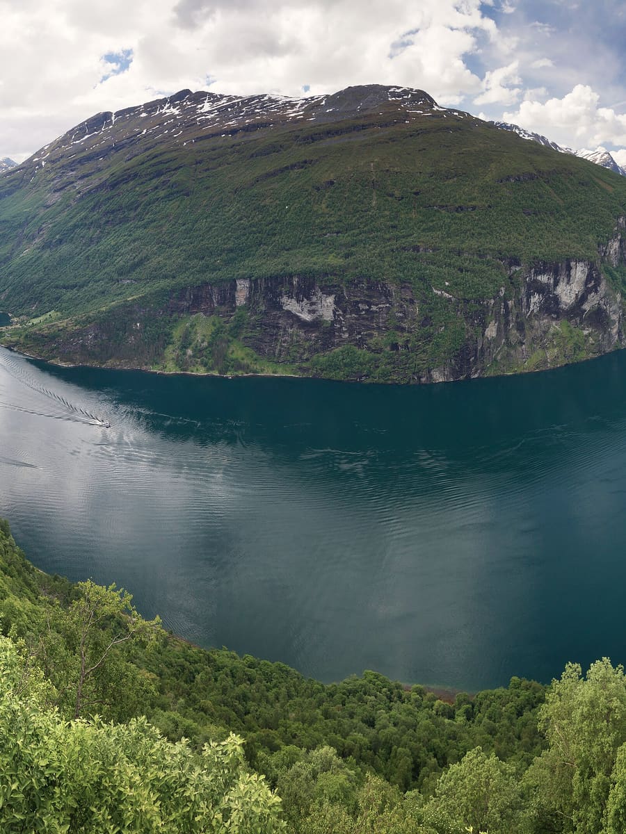 The Geirangerfjord in Norway, seen from the mountain road above it