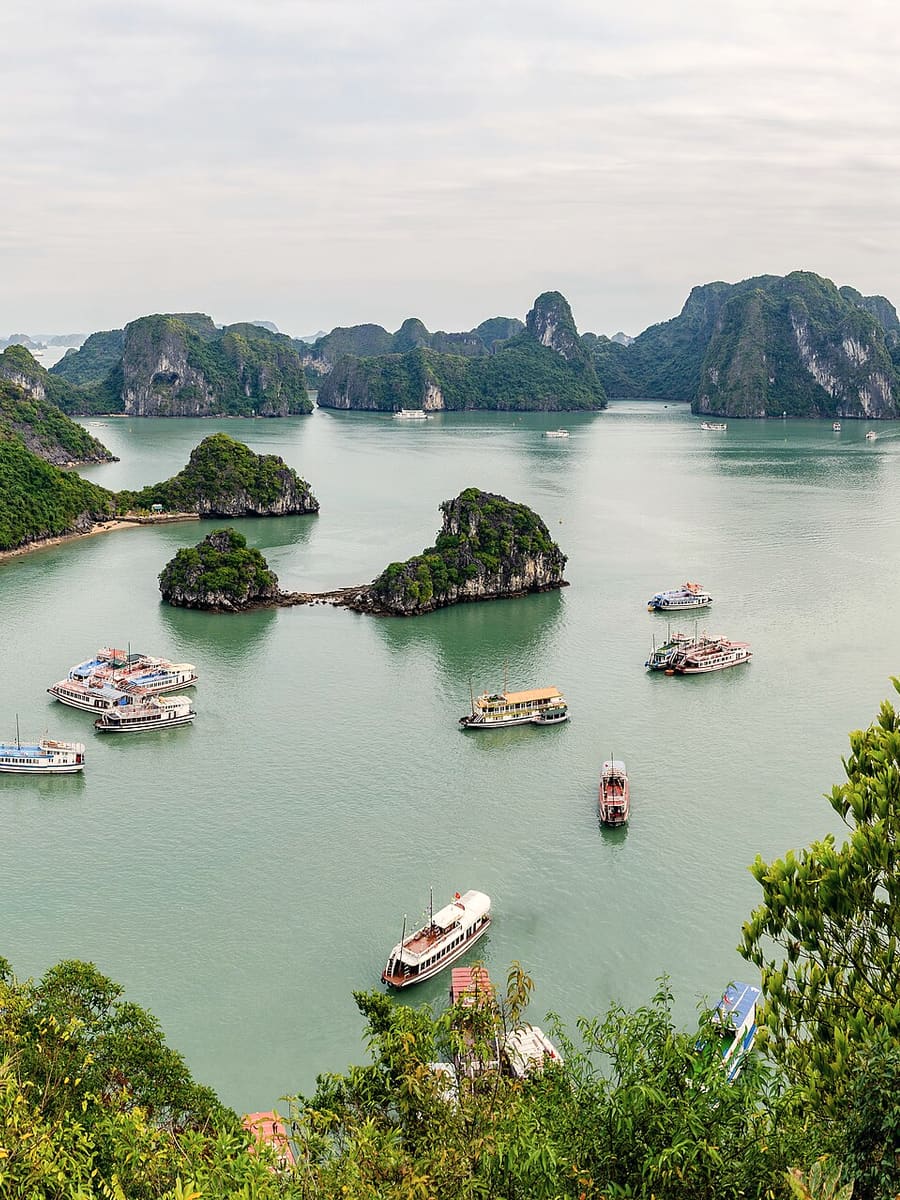 Boats among the limestone islands of Ha Long Bay